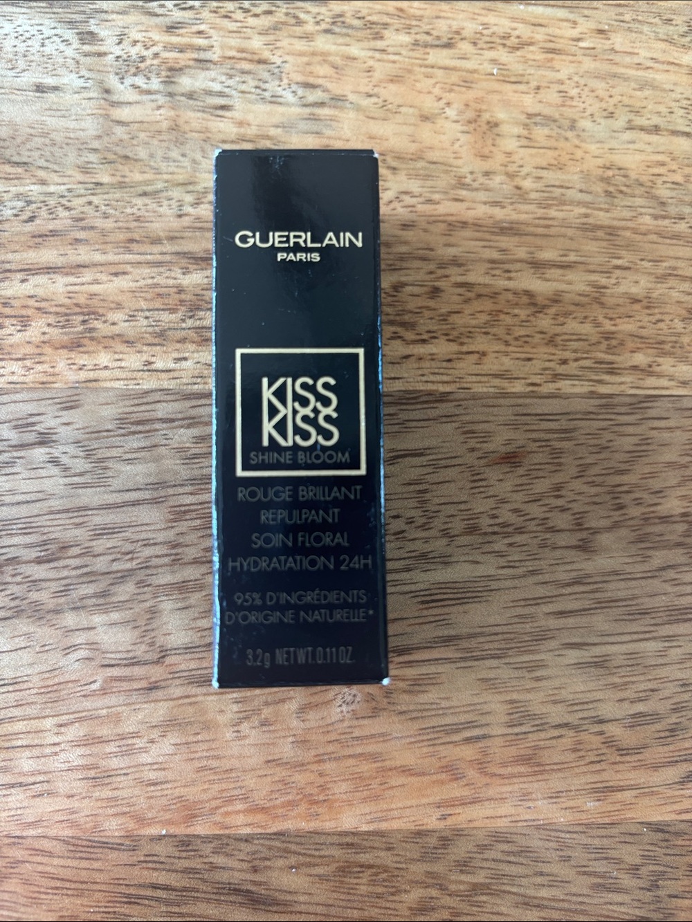 Guerlain KissKiss Shine Bloom Lipstick in shade 809 Flower Fever